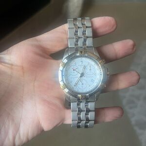 Tissot Silver and Gold Chronograph Watch